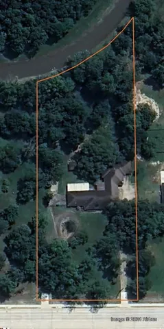 a view of backyard with green space