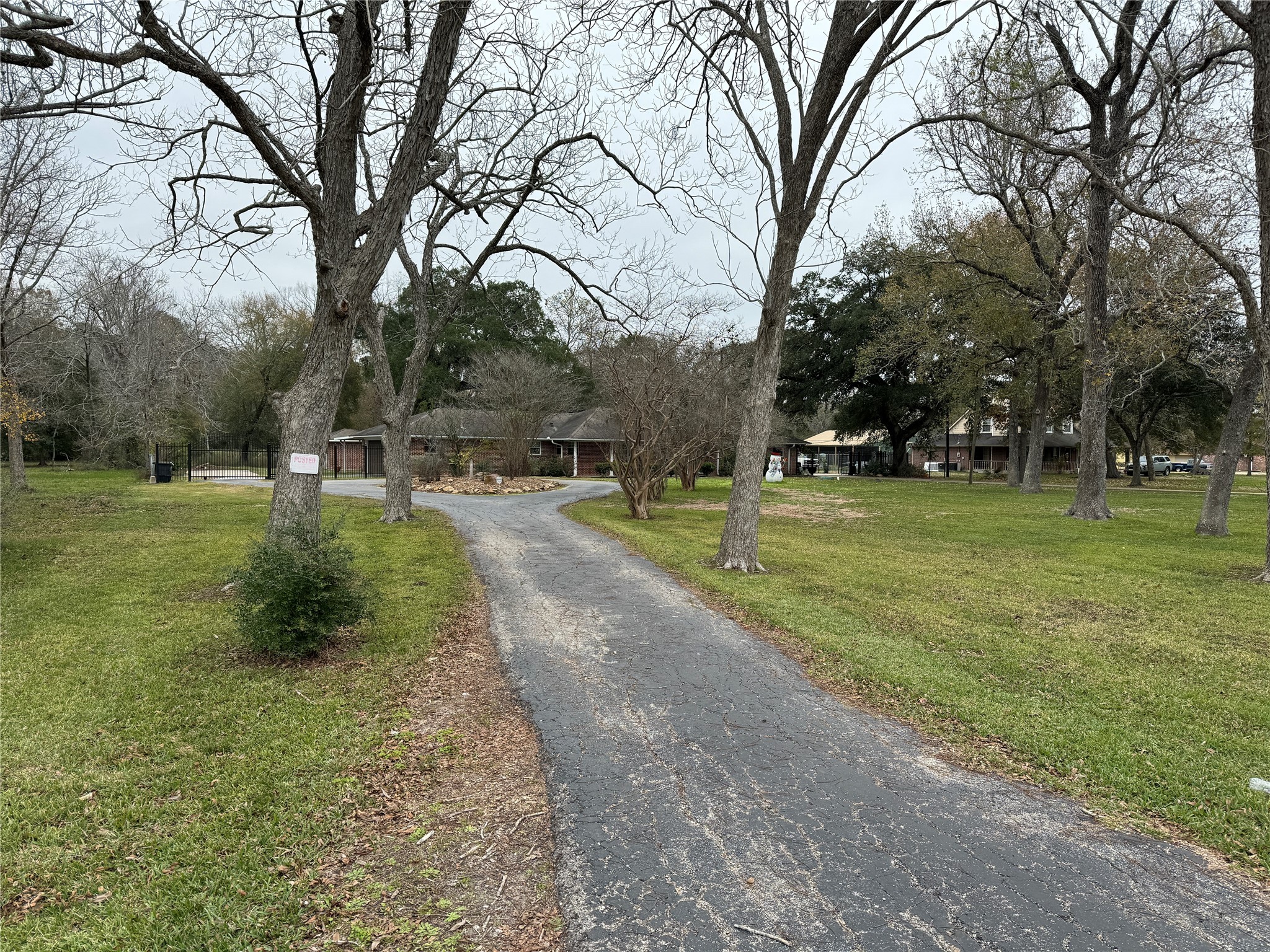 10702 Crosby Lynchburg Road Highlands, TX 77562 - Photo 5 of 18 a view of a park with large trees