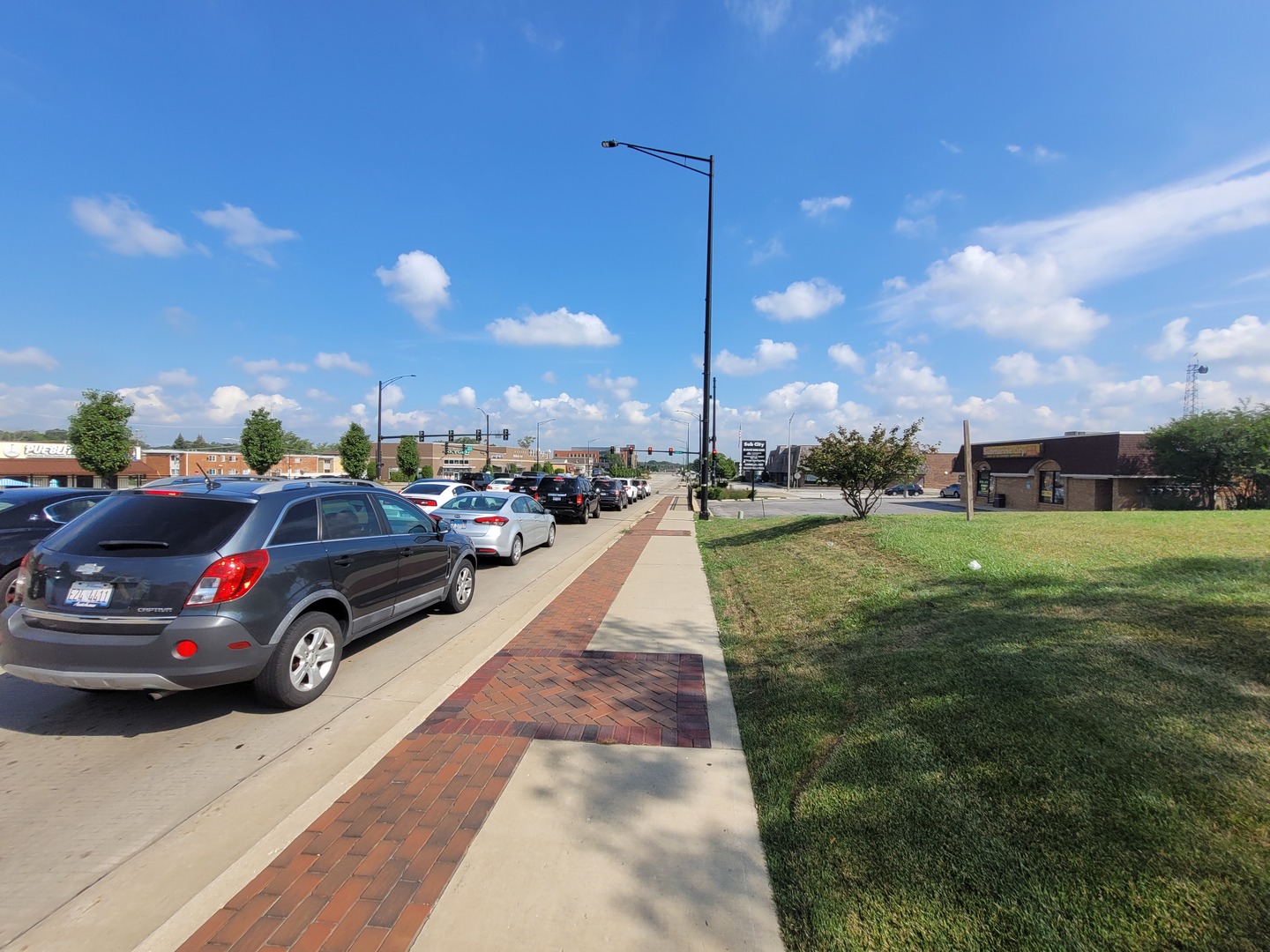 14445 South La Grange Road Orland Park, IL 60462 - Photo 4 of 7 a view of street with parked cars