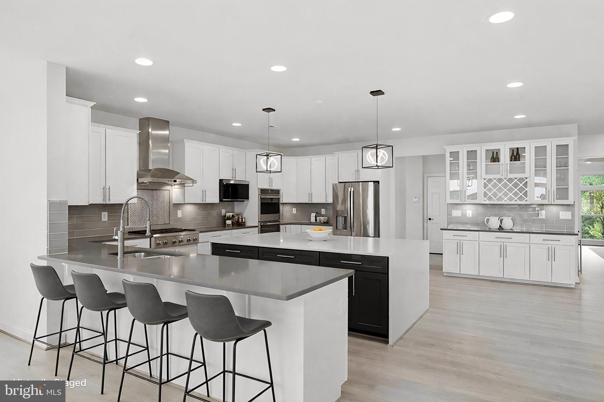 7821 Old Falls Road McLean, VA 22102 - Photo 15 of 47 Gourmet Kitchen w/ Additional Counter Seating