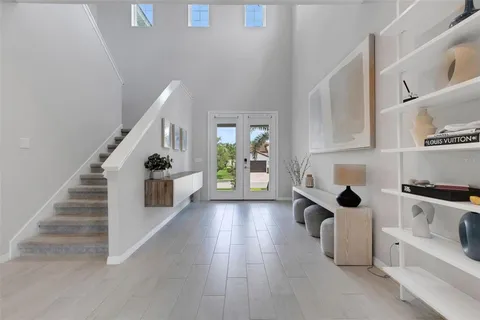 a view of a dining room with furniture window and outside view