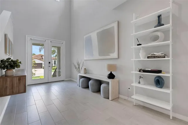 a bedroom with bed and window