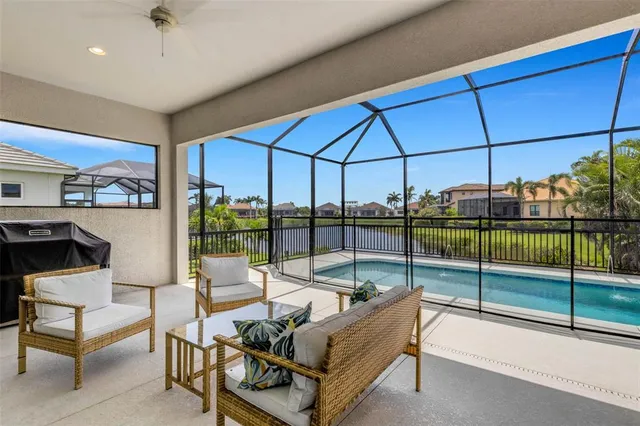 a view of a lake with houses in the back