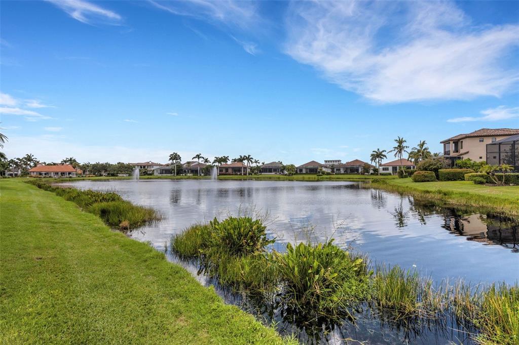 5718 Title Row Drive Bradenton, FL 34210 - Photo 4 of 74 a view of a lake with houses in the back