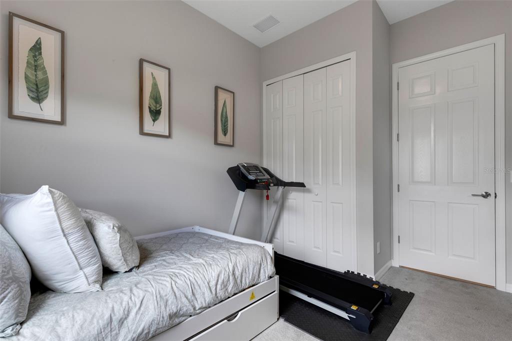 5718 Title Row Drive Bradenton, FL 34210 - Photo 41 of 74 a bedroom with bed and window