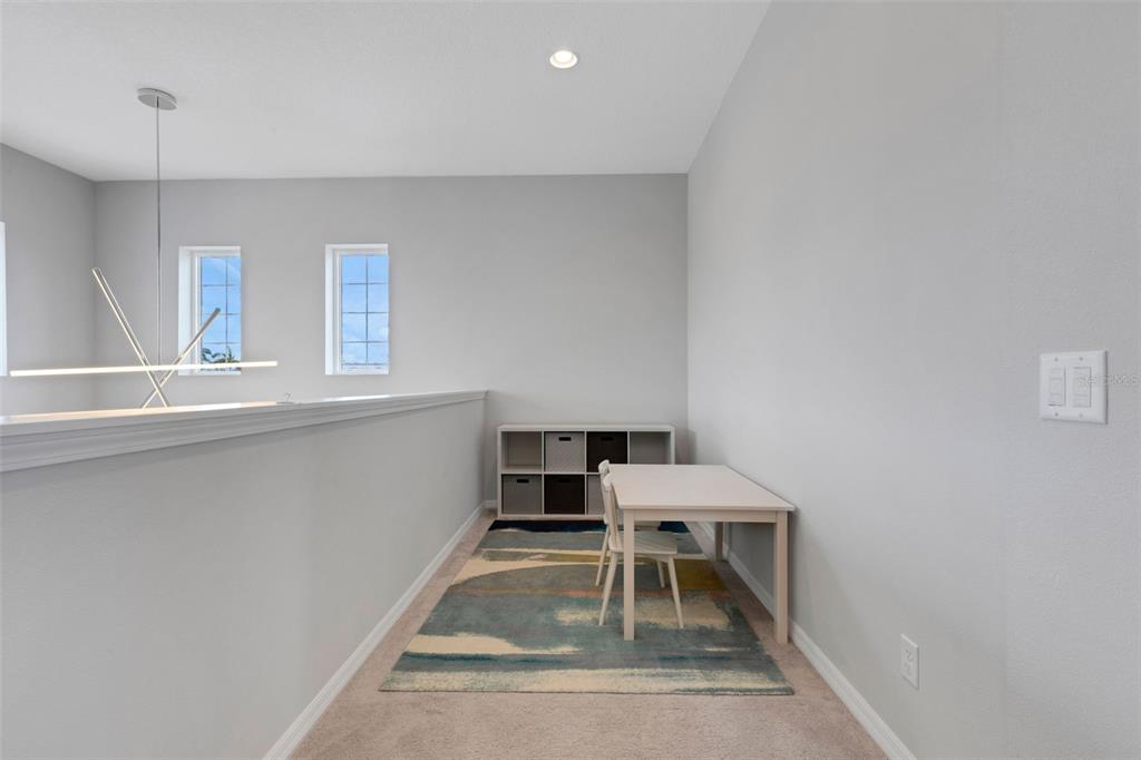 5718 Title Row Drive Bradenton, FL 34210 - Photo 48 of 74 a view of a room with a workspace