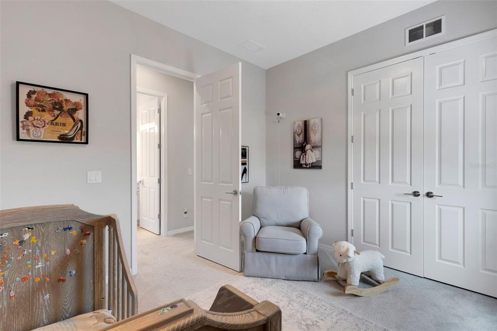 5718 Title Row Drive Bradenton, FL 34210 - Photo 51 of 74 a living room with furniture flowerpot and a rug