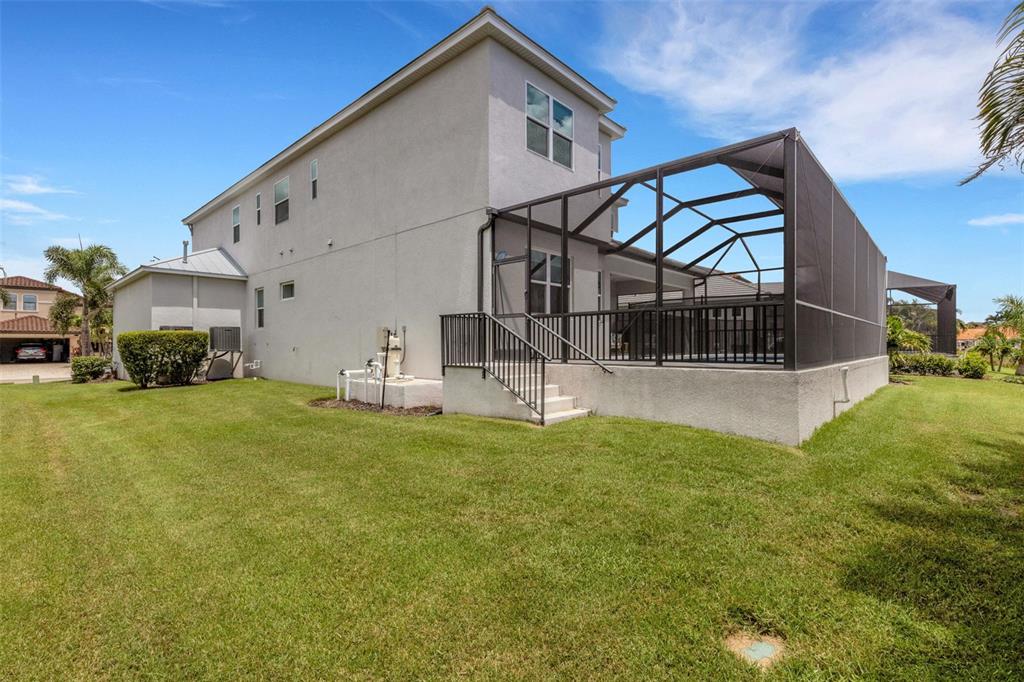 5718 Title Row Drive Bradenton, FL 34210 - Photo 10 of 74 a view of a house with a yard