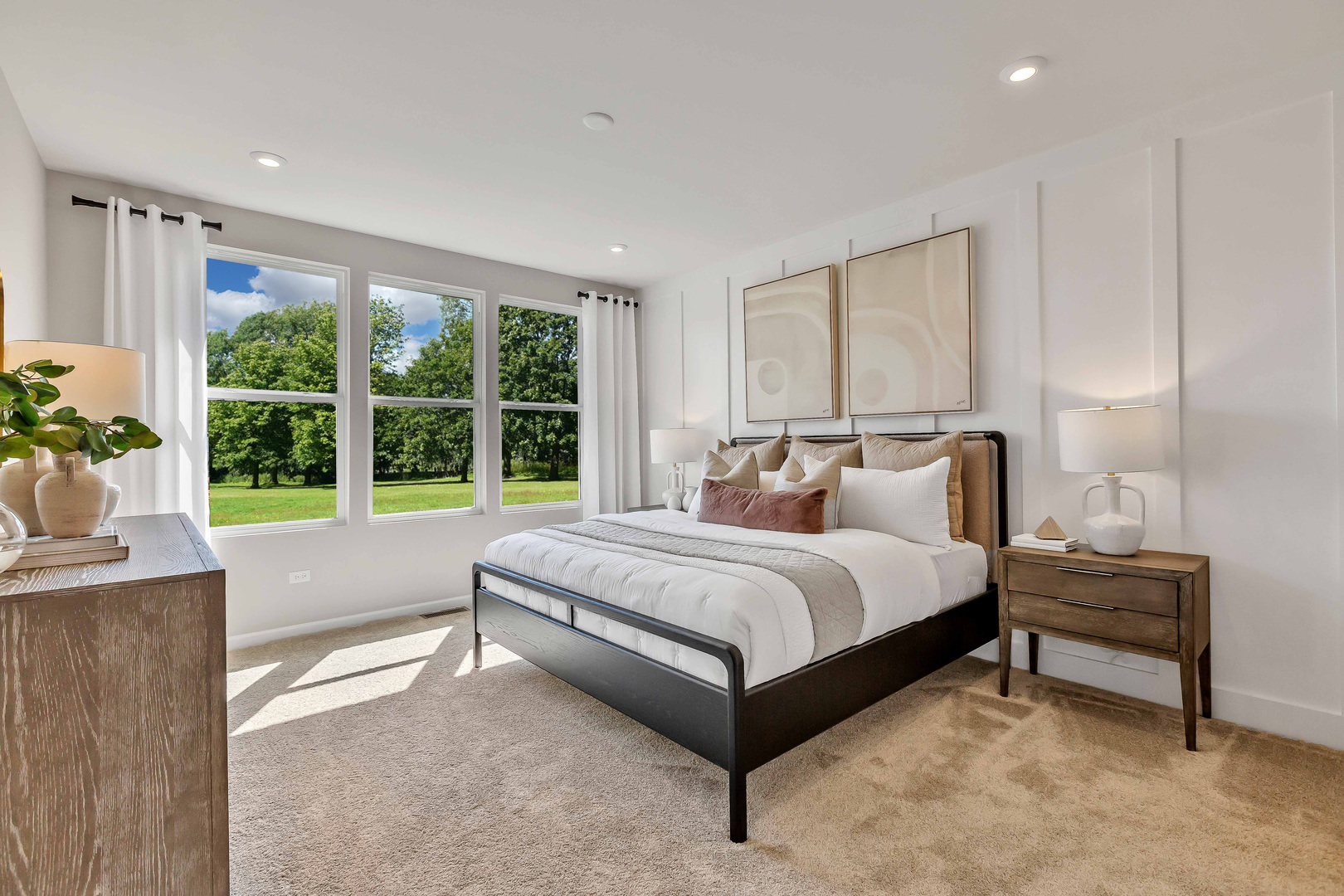 12656 Derry Drive, Unit 34402 Lemont, IL 60439 - Photo 13 of 16 a spacious bedroom with a bed and a large window