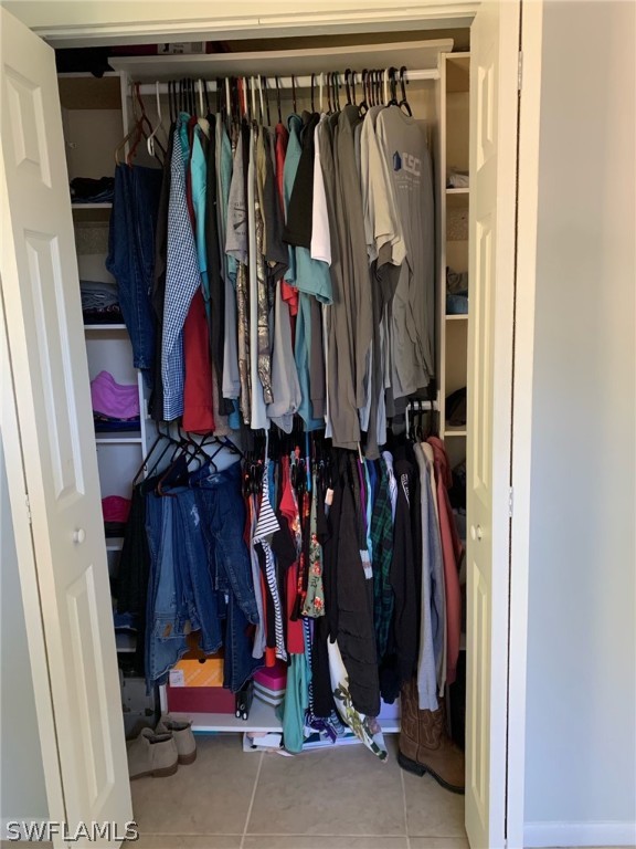 2310 Caladium Road Fort Myers, FL 33905 - Photo 30 of 31 a view of walk in closet with clothes