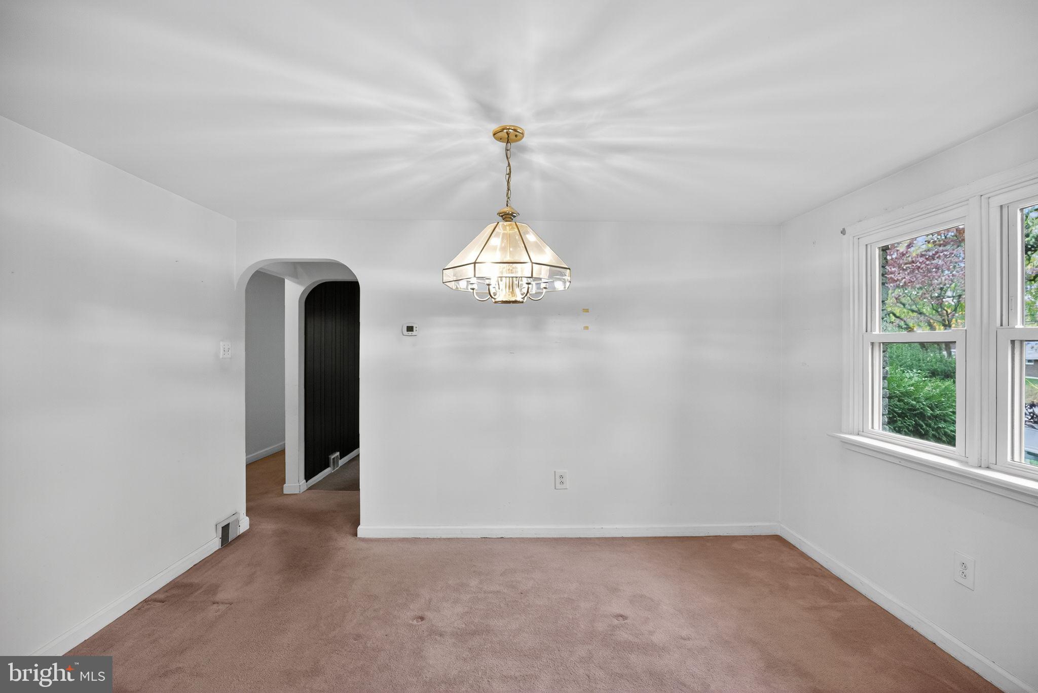 420 North Lewis Road Royersford, PA 19468 - Photo 13 of 28 an empty room with windows and furniture