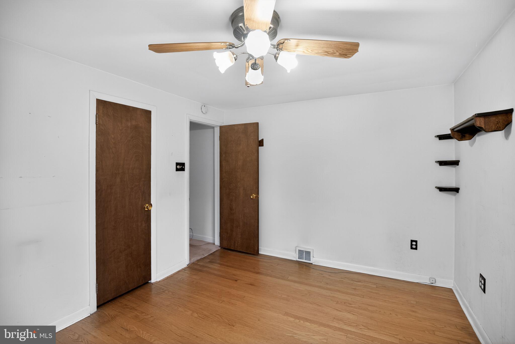420 North Lewis Road Royersford, PA 19468 - Photo 16 of 28 a view of an empty room with a chandelier fan