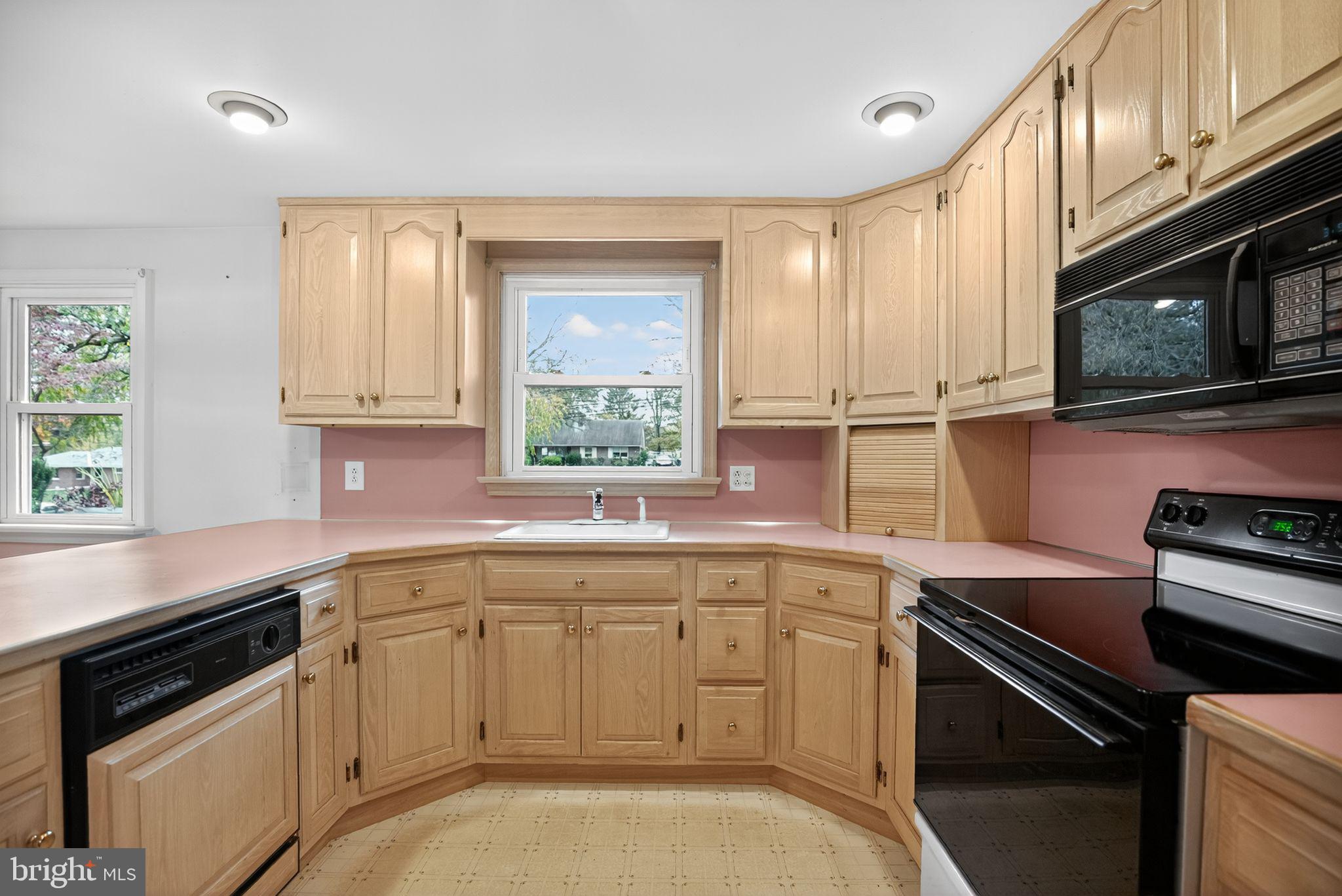 420 North Lewis Road Royersford, PA 19468 - Photo 9 of 28 a kitchen with a sink stove and microwave