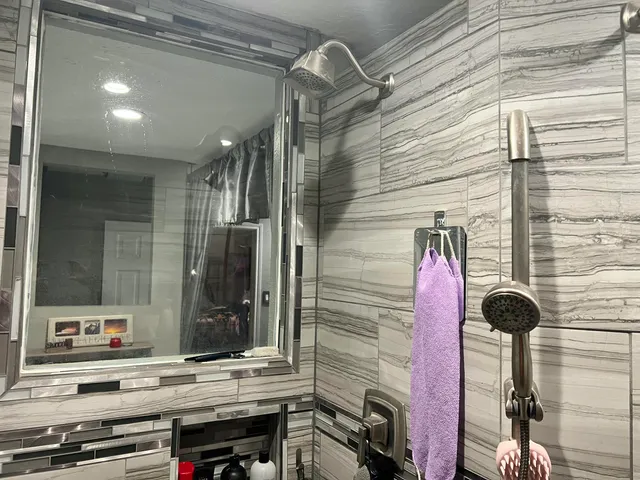 a bathroom with a sink and a mirror