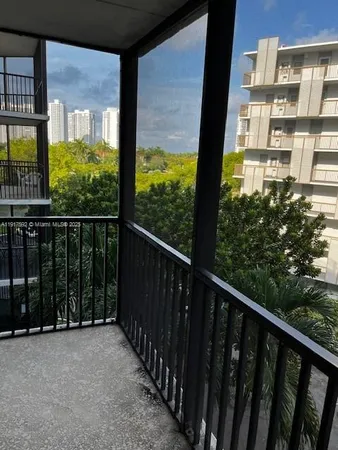a view of a building from a balcony