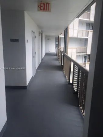 a view of hallway with stairs