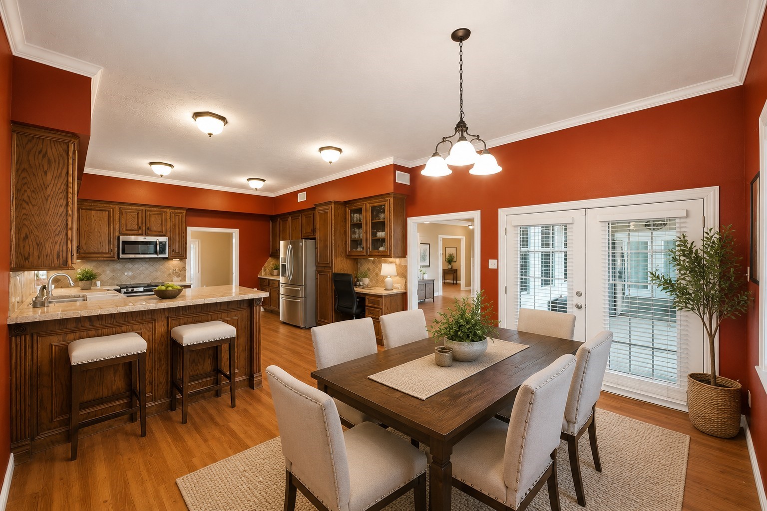 144 Wood Farm Road Huntsville, TX 77320 - Photo 15 of 50 a dining room with wooden floor a chandelier a wooden table and chairs