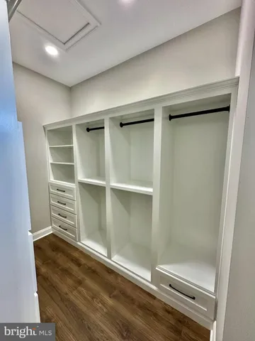 a bath tub sitting next to a window