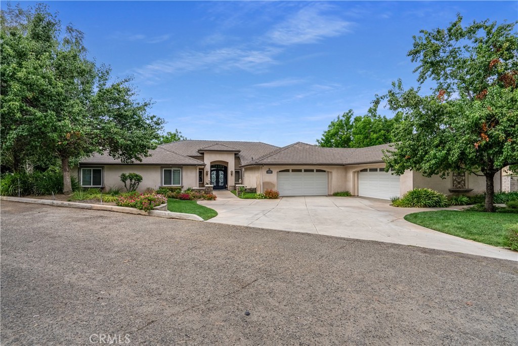1131 Vía Pardal Riverside, CA 92506 - Photo 1 of 1 Front of home with two garage doors to fit several vehicles. 1600 SF+ in size