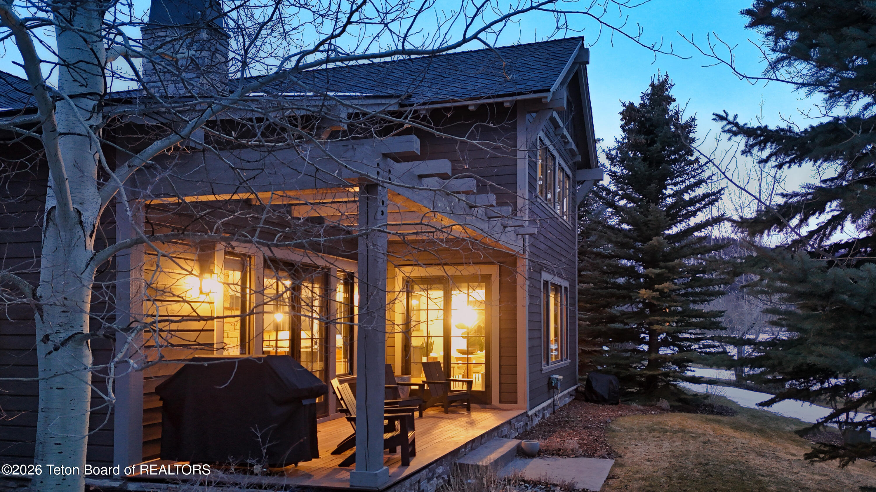 46 Scott Drive Victor, ID 83455 - Photo 2 of 57 Back deck in the Evening