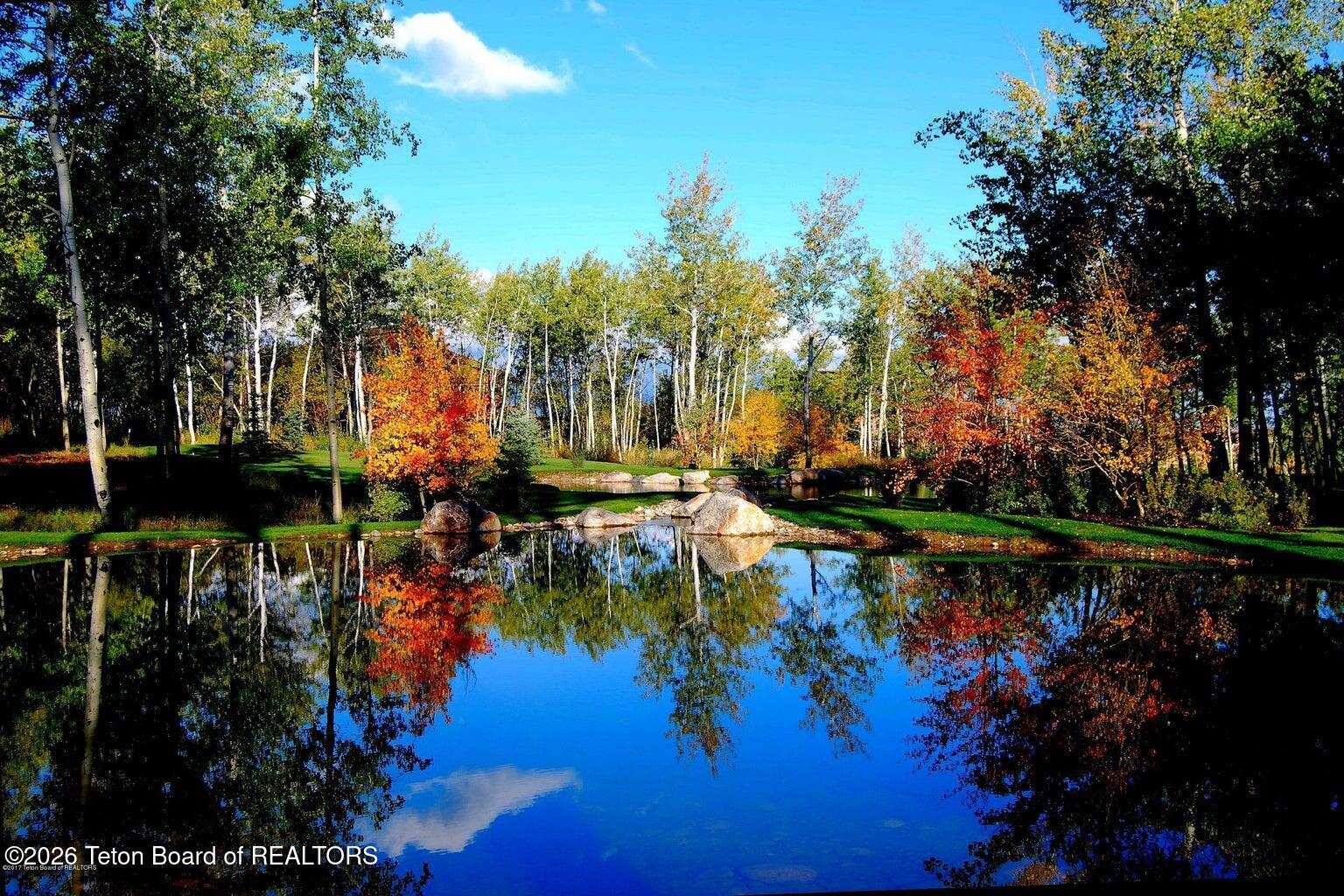 46 Scott Drive Victor, ID 83455 - Photo 41 of 57 Autumn over Pond
