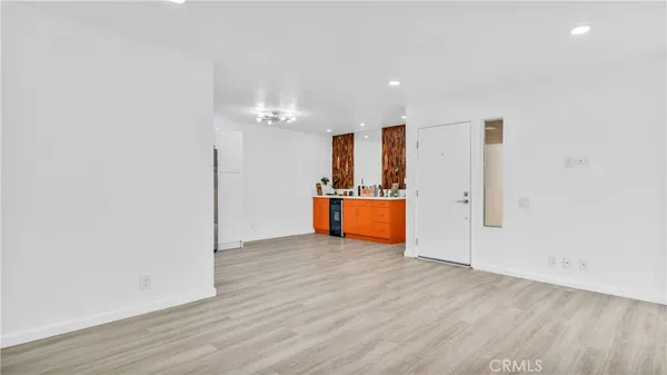 a view of kitchen with wooden floor