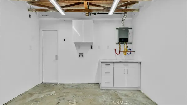 a view of cabinets and window