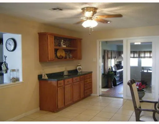 a kitchen with a sink cabinets and appliances