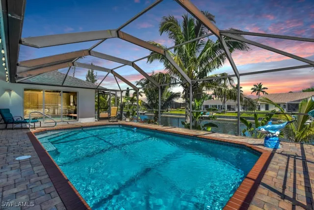 a view of swimming pool with a patio