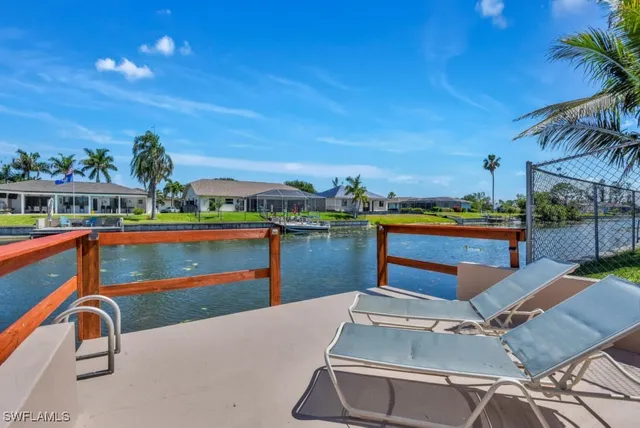a view of a chairs and table in the terrace