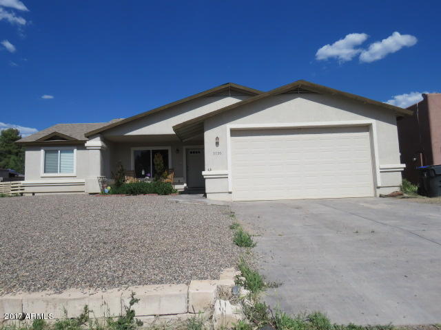 5735 Debbie Lane Rimrock, AZ 86335 - Photo 1 of 23 a view of a house with a yard and garage