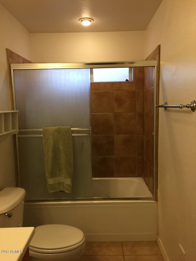 5735 Debbie Lane Rimrock, AZ 86335 - Photo 10 of 23 a bathroom with a toilet and a shower