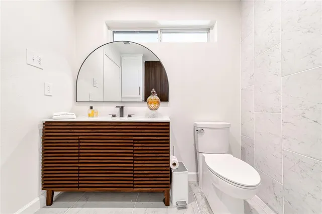 a bathroom with a sink and a toilet