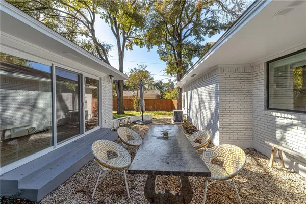 a outdoor living space with furniture and a potted plant