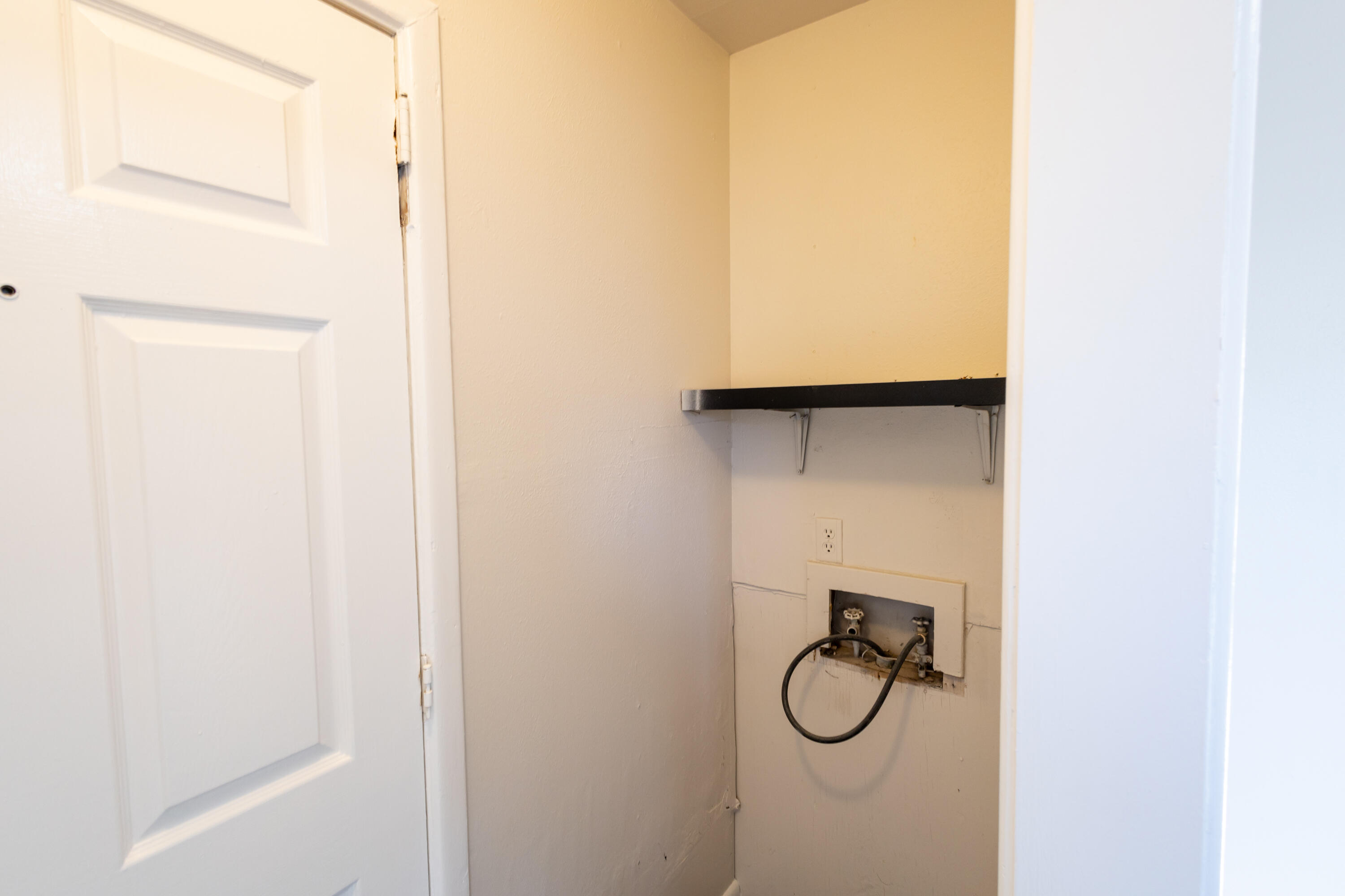 606 Bangor Avenue Lubbock, TX 79416 - Photo 22 of 26 a bathroom with a glass shower door