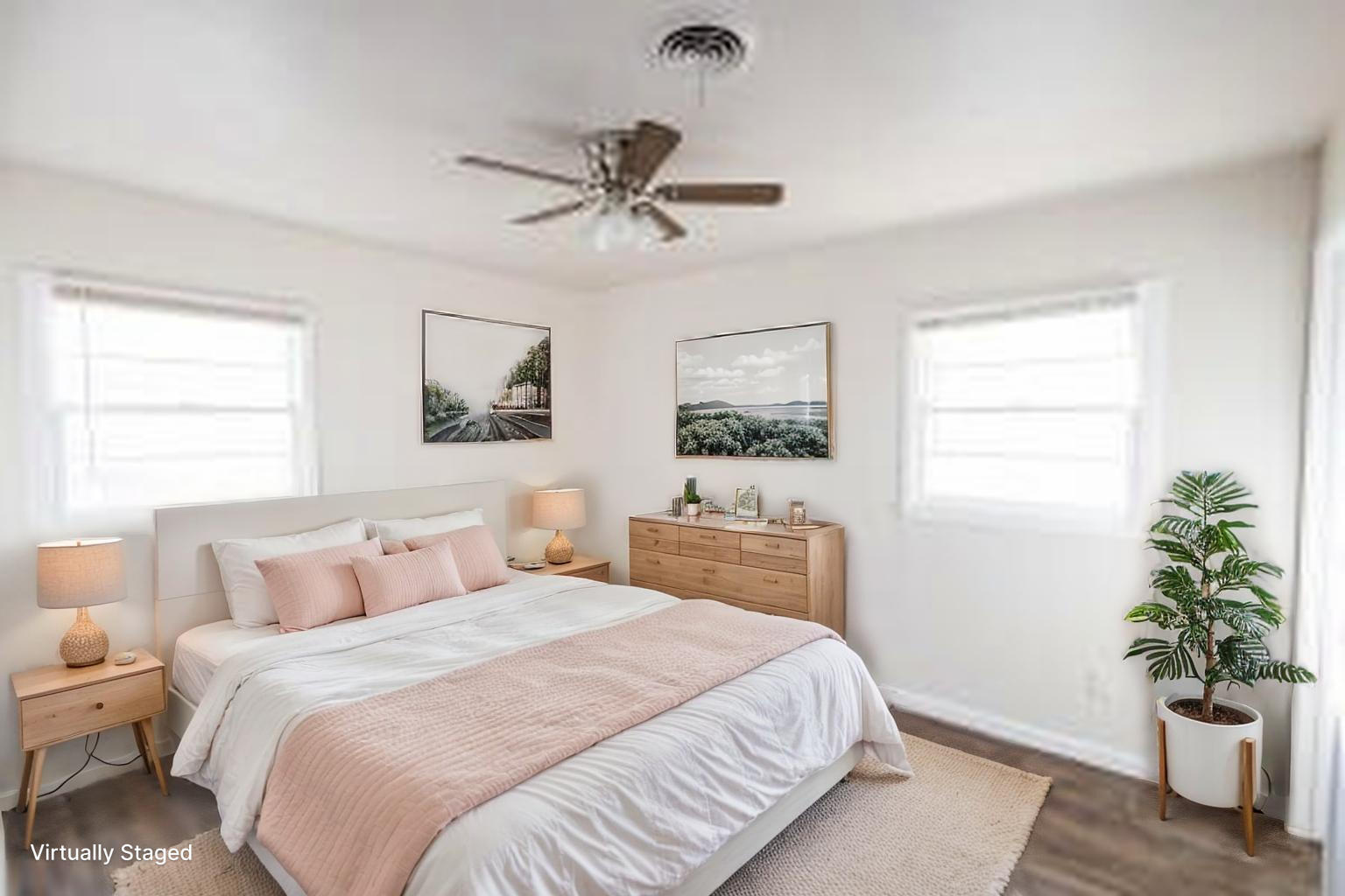 606 Bangor Avenue Lubbock, TX 79416 - Photo 5 of 26 a bedroom with a bed and a potted plant