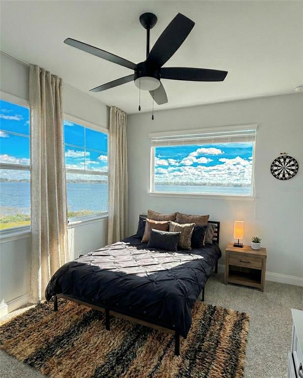 236 Caladium Avenue Lake Alfred, FL 33850 - Photo 20 of 33 a bedroom with bed and window