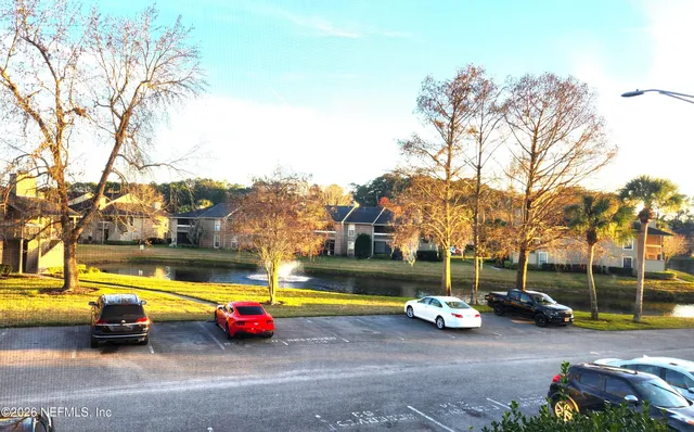 a view of yard with swimming pool and outdoor seating