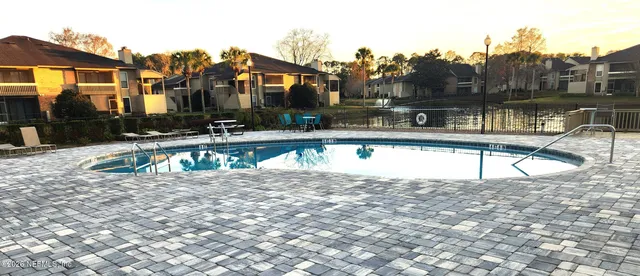 a view of a house with a swimming pool