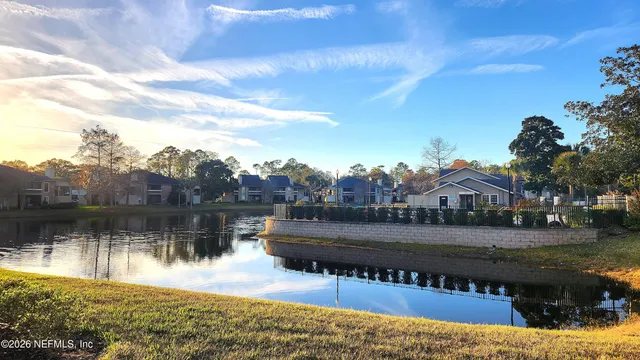 a view of a lake with houses
