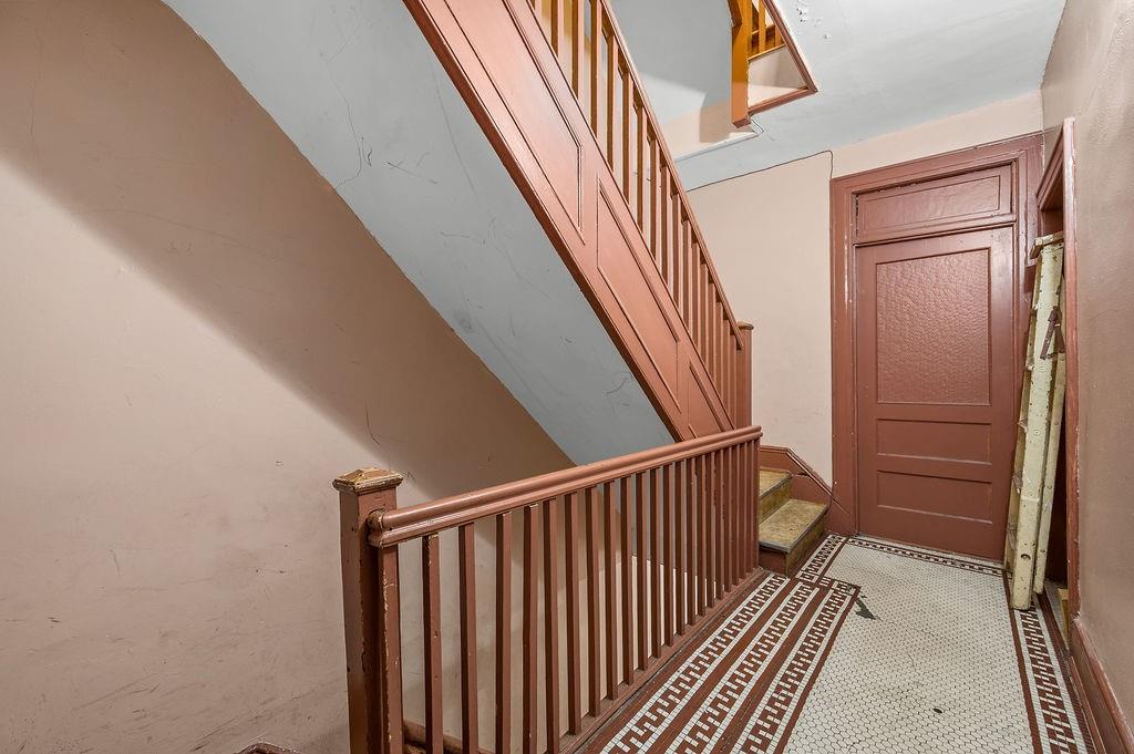 86 Quentin Road Brooklyn, NY 11223 - Photo 22 of 32 a view of staircase with railing and stairs