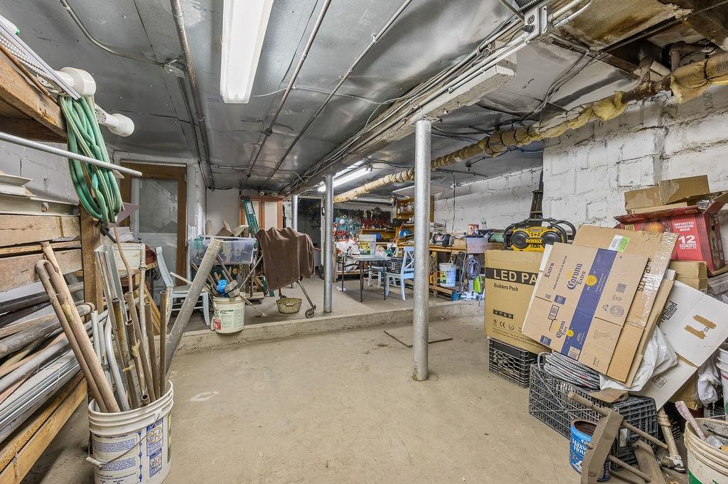 86 Quentin Road Brooklyn, NY 11223 - Photo 28 of 32 a view of a room with gym equipment