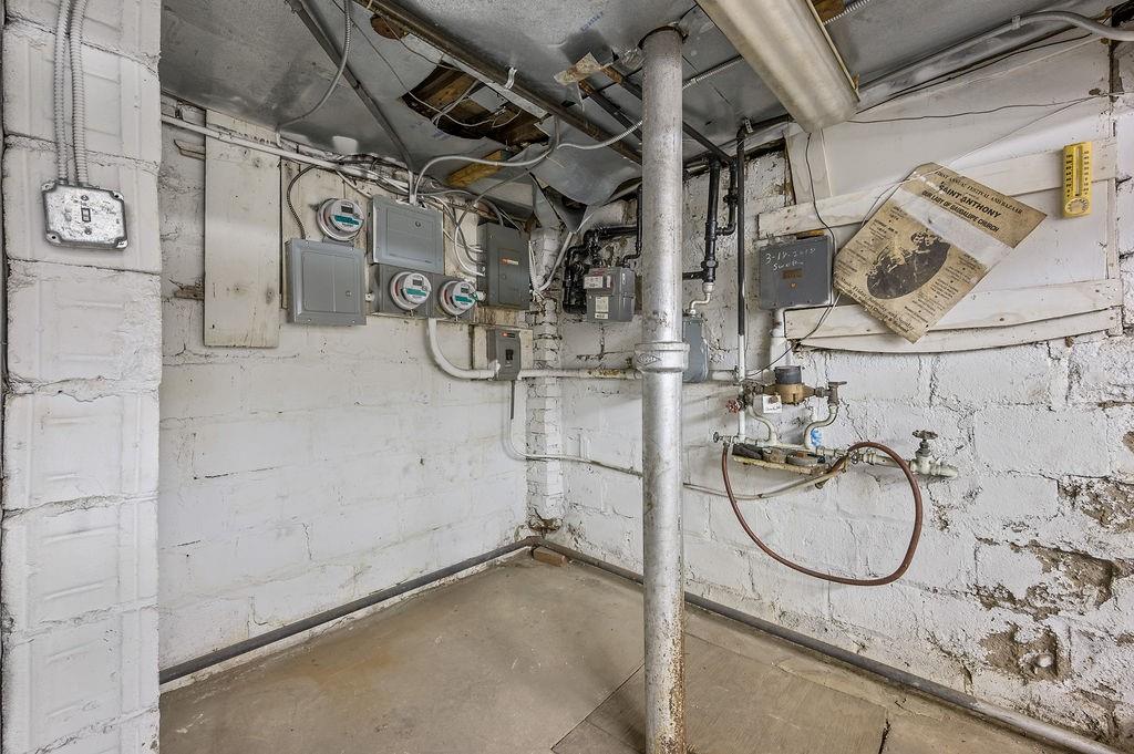 86 Quentin Road Brooklyn, NY 11223 - Photo 29 of 32 a bathroom with a granite countertop sink a mirror and shower