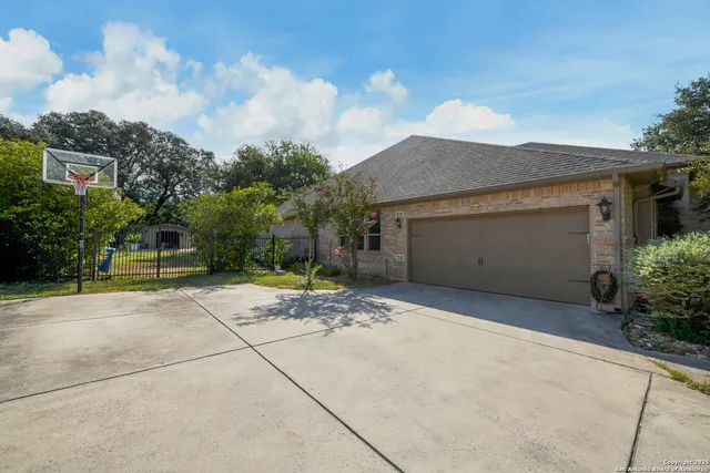 a house view with a backyard space