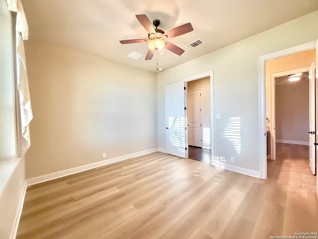 a view of an empty room and window