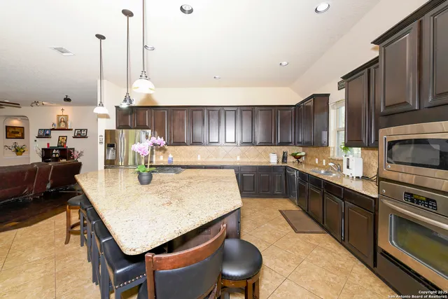 a view of kitchen and kitchen island
