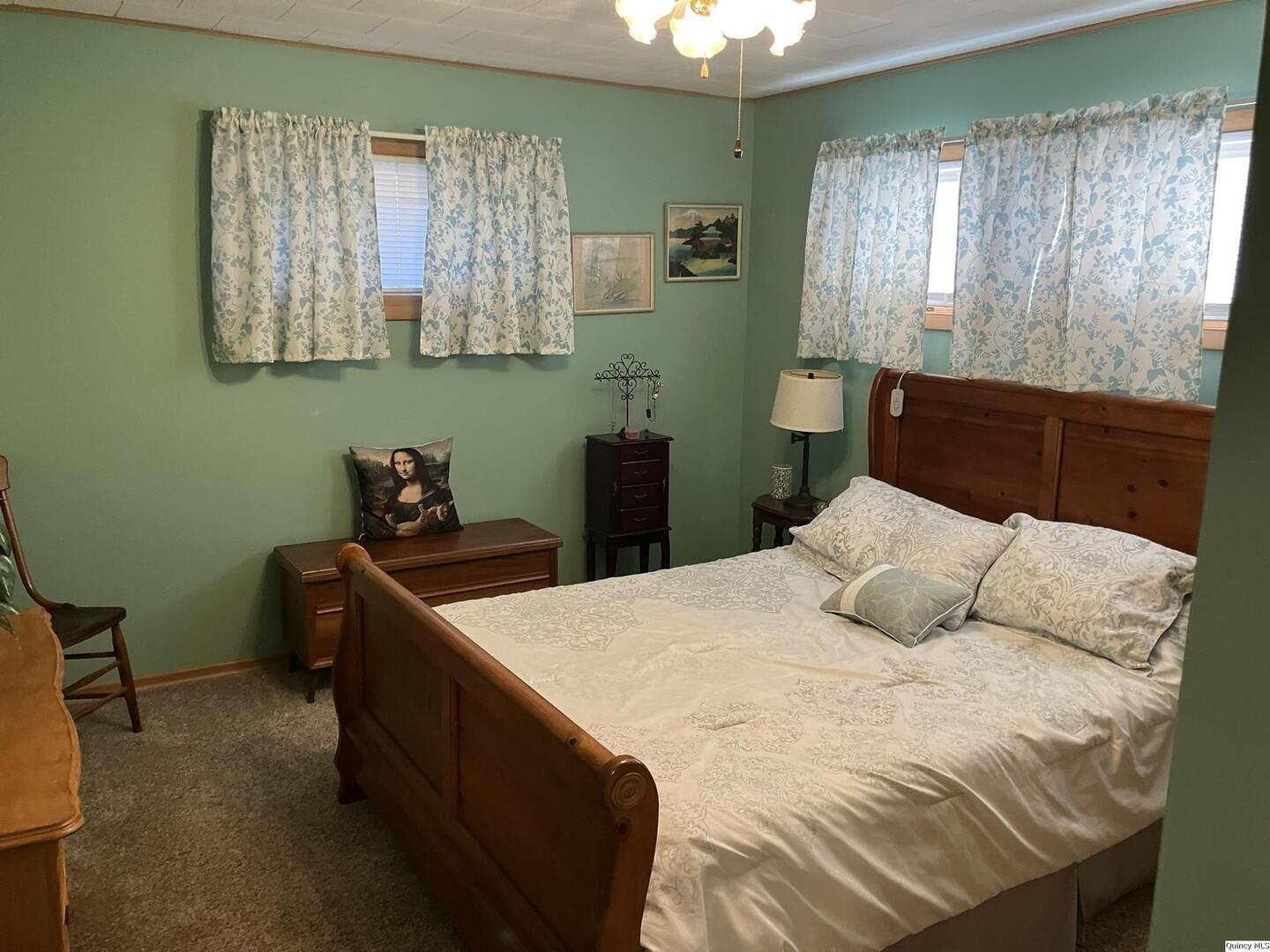 2524 Southbrook Road Quincy, IL 62305 - Photo 13 of 32 a bedroom with a bed and window