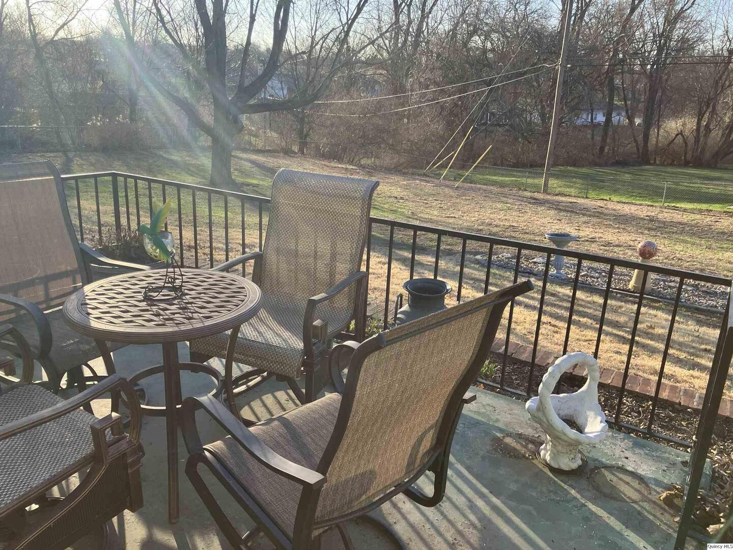2524 Southbrook Road Quincy, IL 62305 - Photo 24 of 32 a view of balcony with wooden floor and outdoor seating