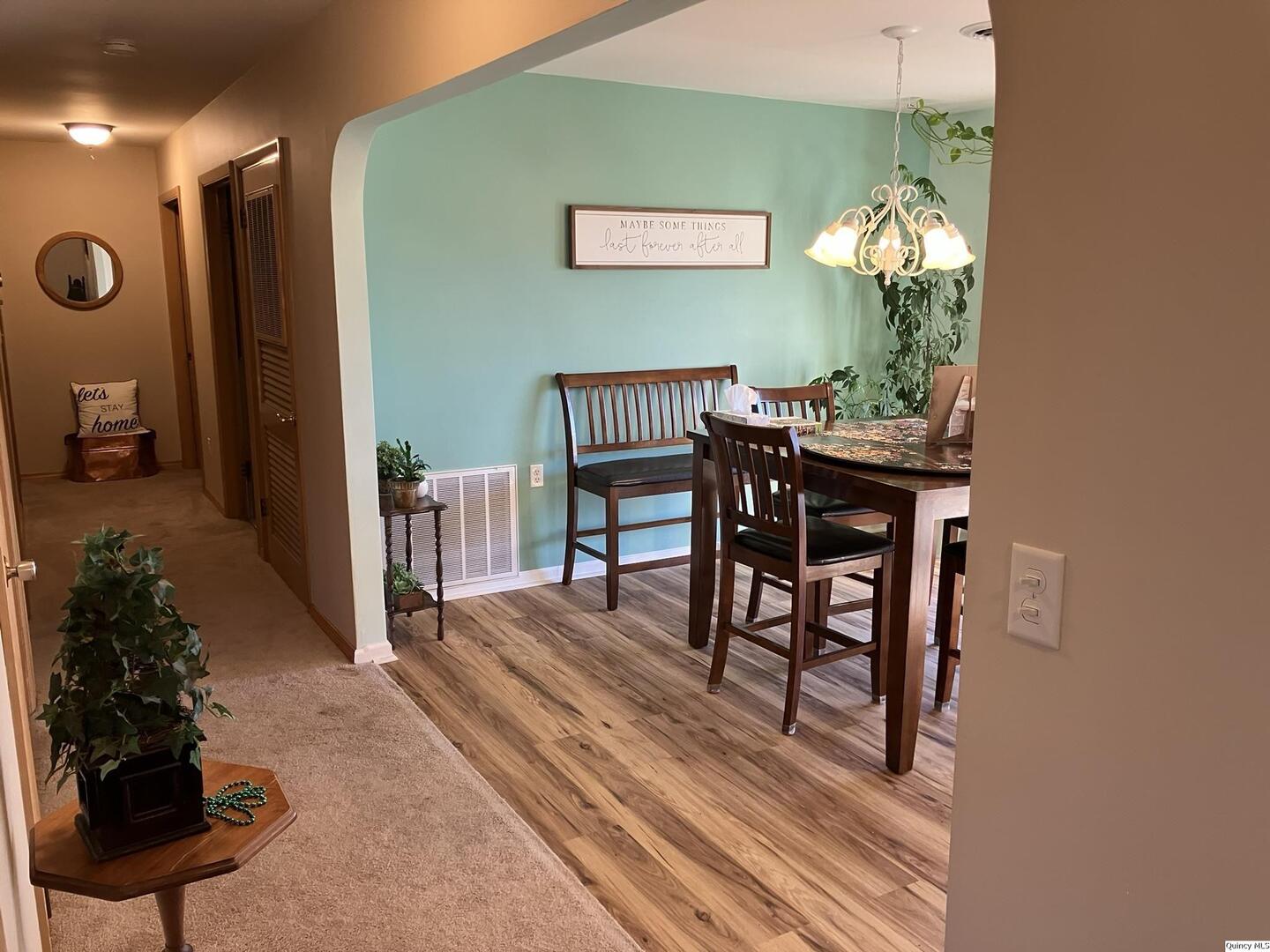 2524 Southbrook Road Quincy, IL 62305 - Photo 9 of 32 a view of a dining room with furniture and chandelier