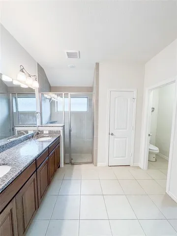 a view of a roof deck with wooden floor and fence